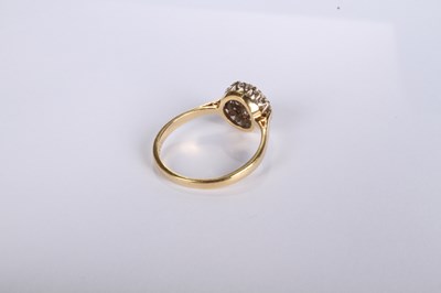Lot 20 - An 18 carat yellow gold diamond cluster ring,...