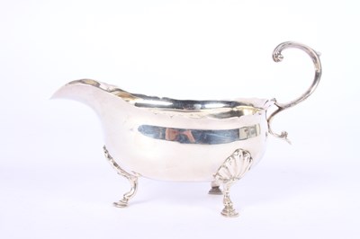 Lot 49 - A Victorian silver helmet shaped sauce boat,...
