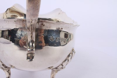 Lot 49 - A Victorian silver helmet shaped sauce boat,...