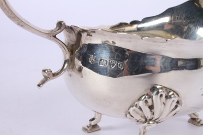 Lot 49 - A Victorian silver helmet shaped sauce boat,...