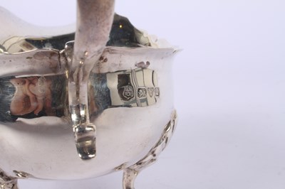 Lot 49 - A Victorian silver helmet shaped sauce boat,...