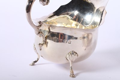 Lot 36 - A pair of George V silver helmet shaped sauce...