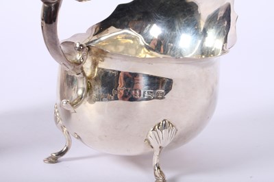 Lot 36 - A pair of George V silver helmet shaped sauce...