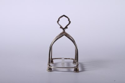 Lot 45 - A George VI silver four division toast rack,...
