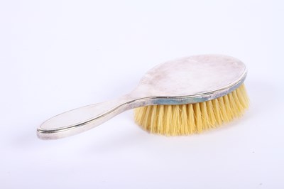 Lot 46 - A George V silver-backed six piece dressing...