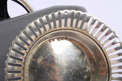 Lot 57 - A pair of George V pierced silver bon bon...