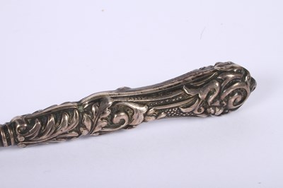 Lot 48 - A collection of silver items comprising a pair...