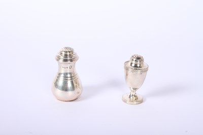 Lot 35 - A collection of silver items comprising an...