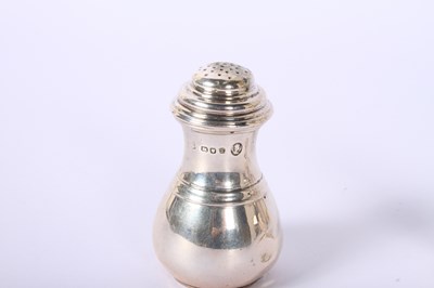 Lot 35 - A collection of silver items comprising an...