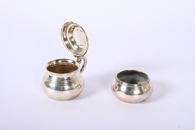 Lot 35 - A collection of silver items comprising an...