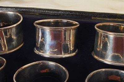 Lot 55 - A set of six silver napkin rings, marks rubbed,...