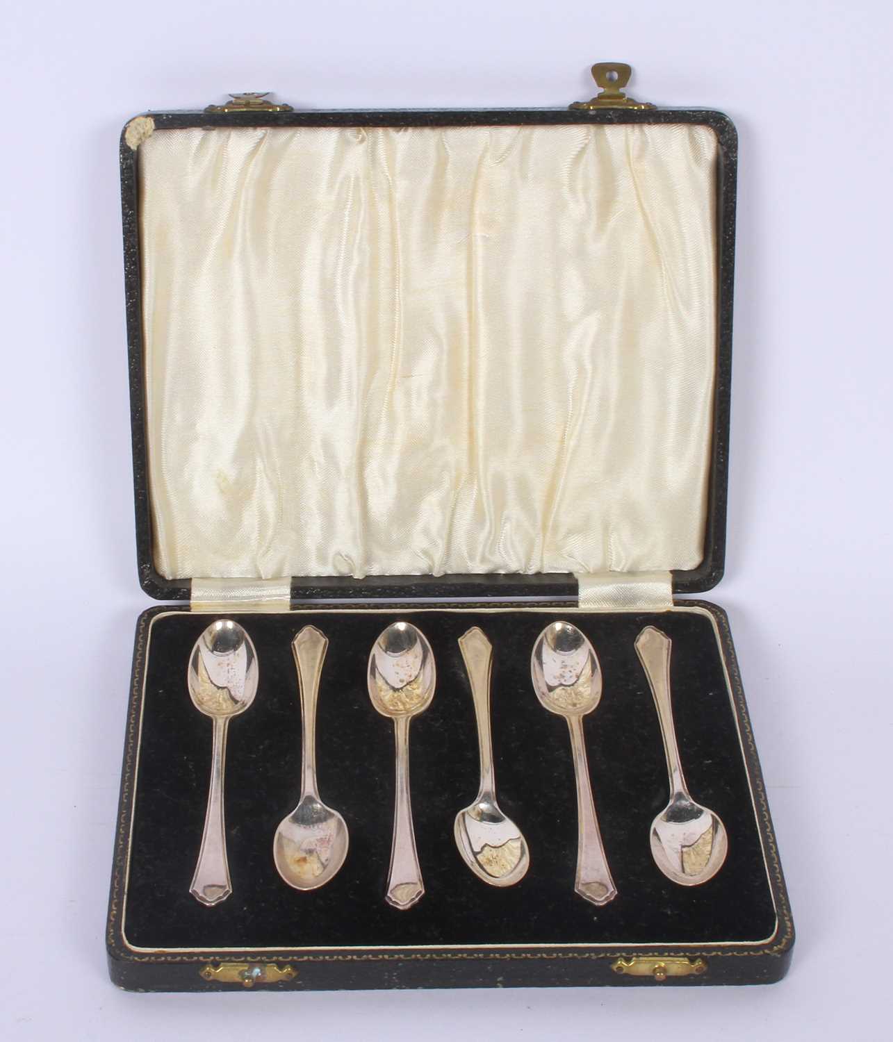 Lot 69 - A set of six silver teaspoons, Sheffield 1953,...