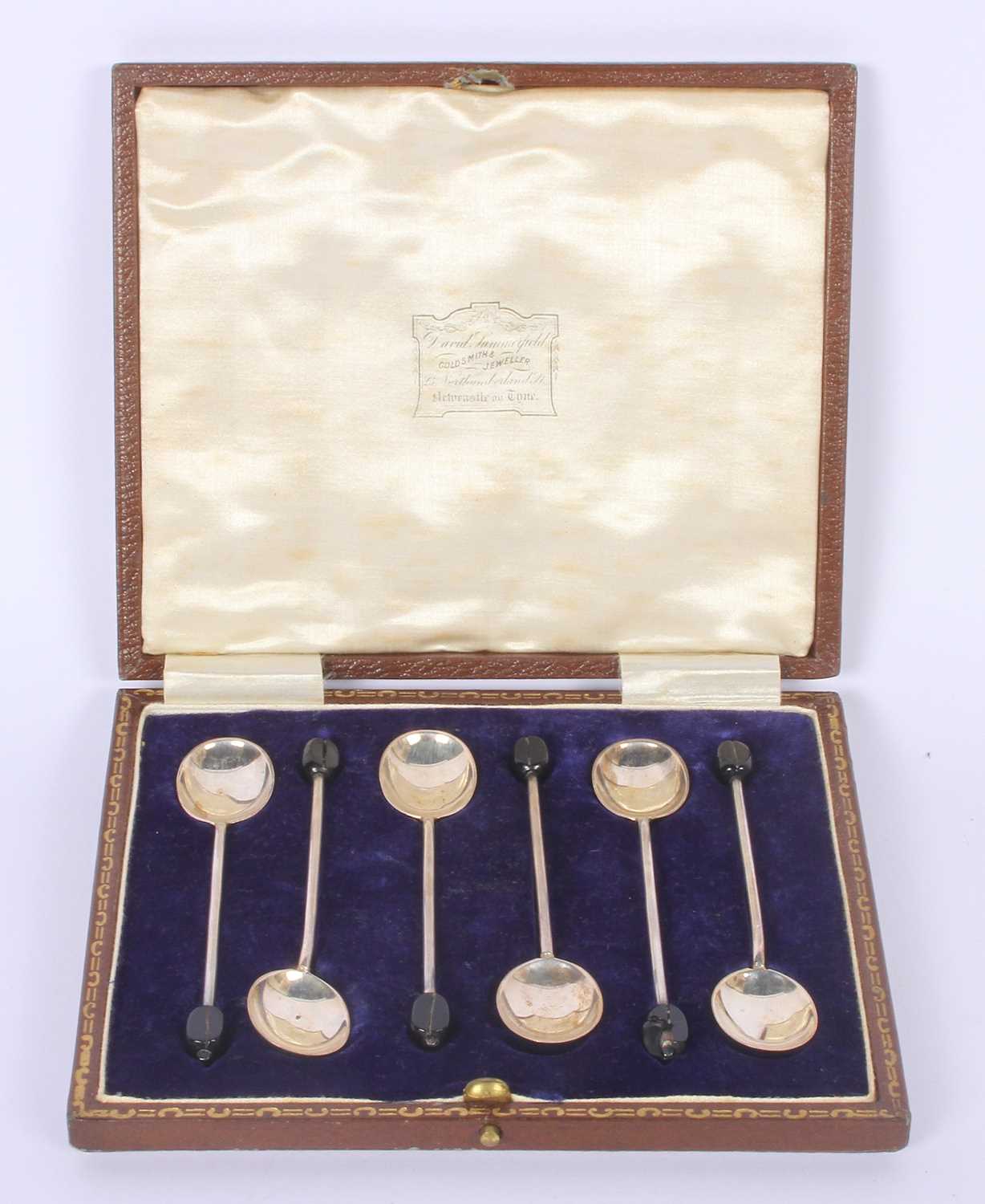 Lot 74 - A set of six silver coffee-bean spoons,...