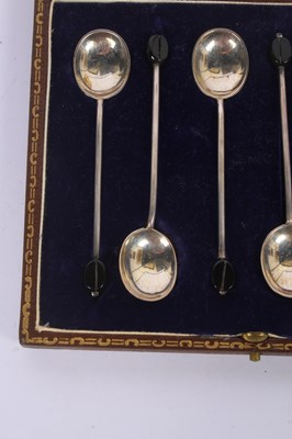 Lot 74 - A set of six silver coffee-bean spoons,...