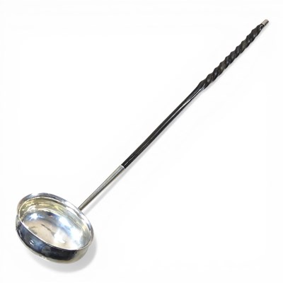 Lot 149 - A Georgian metalwares toddy ladle, with a...
