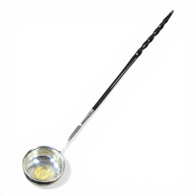 Lot 158 - A Georgian metalwares toddy ladle, the bowl...