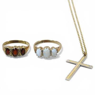 Lot 181 - A 9 carat gold three stone opal dress ring, 3g,...
