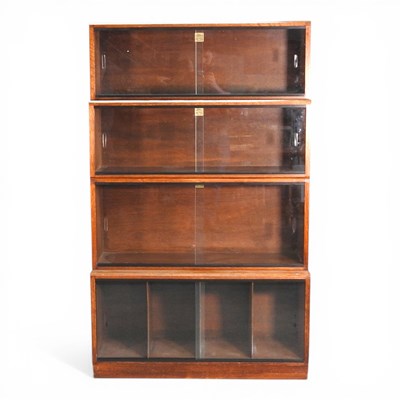 Lot 420 - A mid 20th century glazed sectional four tier...
