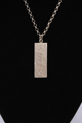 Lot 63 - A silver ingot on a long chain necklace, 50g...