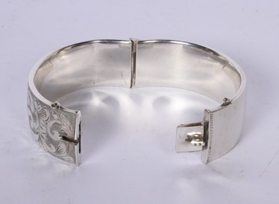 Lot 52 - A George Jensen silver hinged bangle with...