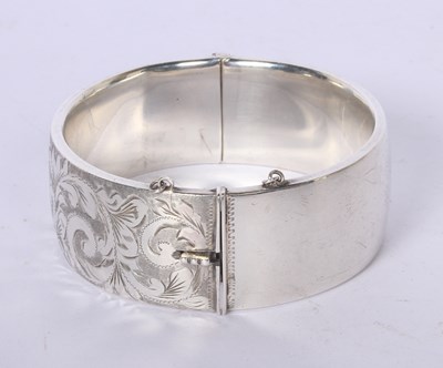Lot 52 - A George Jensen silver hinged bangle with...
