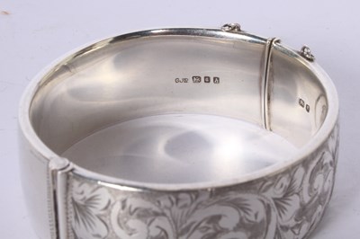 Lot 52 - A George Jensen silver hinged bangle with...