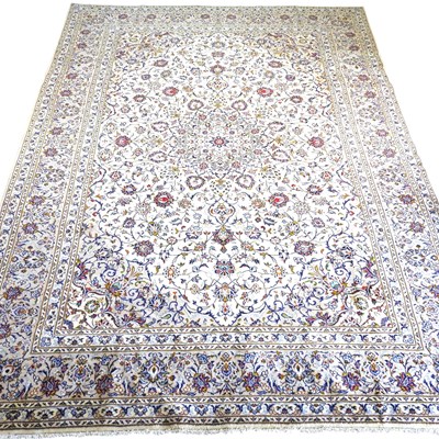 Lot 590 - A Persian kashan carpet, with scrolling floral...