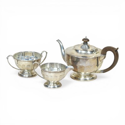 Lot 150 - An early 20th century silver three piece tea...
