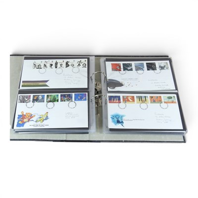 Lot 453 - An album of first day cover stamps, circa...