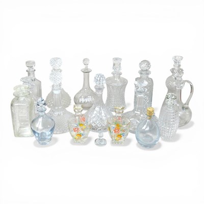 Lot 520 - A collection of glass decanters and stoppers,...