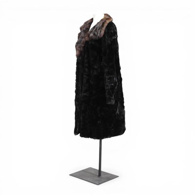 Lot 257 - A vintage ladies black fur coat, with a brown...