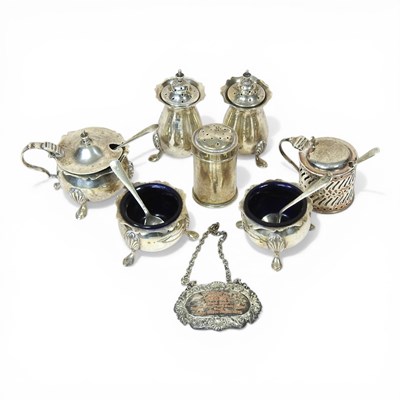 Lot 209 - An Edwardian silver condiment set, comprising...