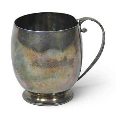 Lot 227 - An early 20th century silver mug, of plain...