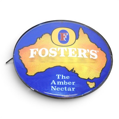 Lot 719 - A Fosters, The Amber Nectar illuminated...