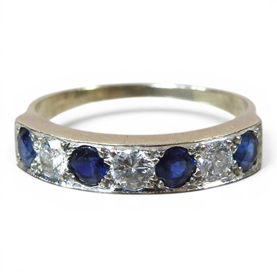 Lot 153 - A 9 carat gold sapphire and diamond half hoop...