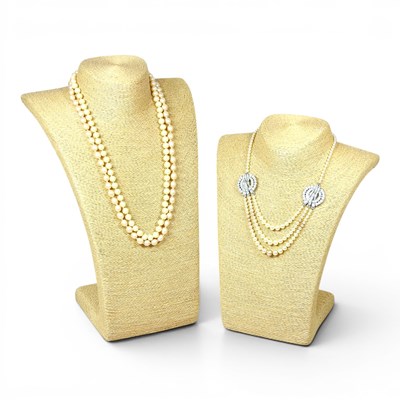 Lot 492 - A freshwater single strand pearl bead necklace,...