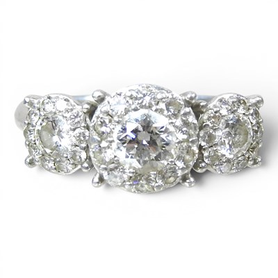 Lot 179 - A platinum and diamond cluster ring, the...