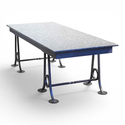 Lot 165 - A modern black marble resin dining table, of...