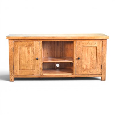 Lot 572 - A modern light oak side cabinet