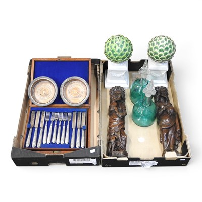 Lot 686 - A pair of figural continental carved wooden...