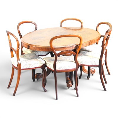 Lot 700 - A Victorian dining table, with a hinged oval...