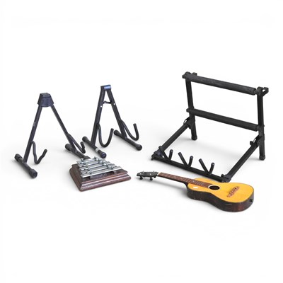Lot 632 - A ukulele, cased, together with a glockenspiel...