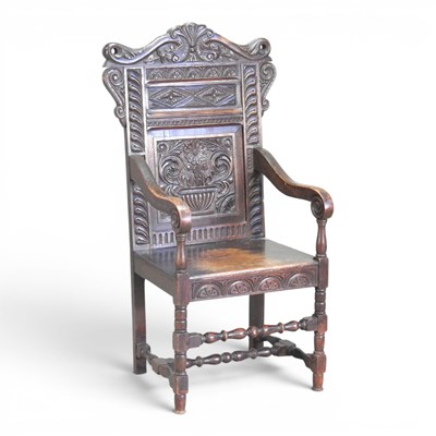 Lot 528 - A 17th century style carved oak wainscot...
