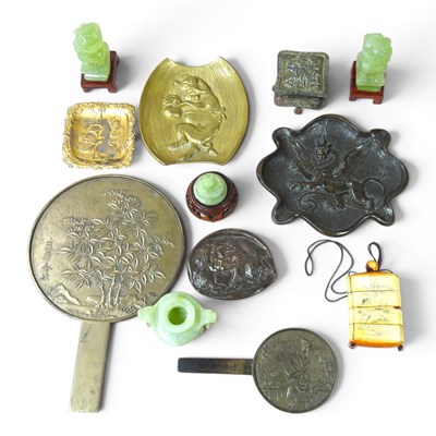 Lot 263 - A Chinese polished bronze hand mirror, 27cm...