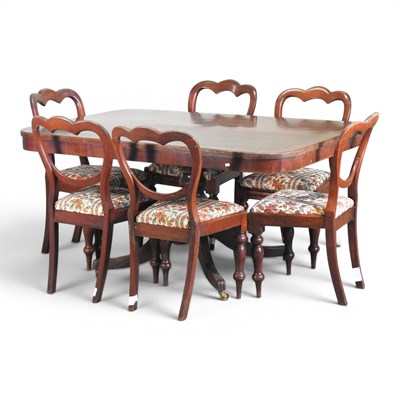 Lot 363 - A Regency mahogany dining table, with a hinged...