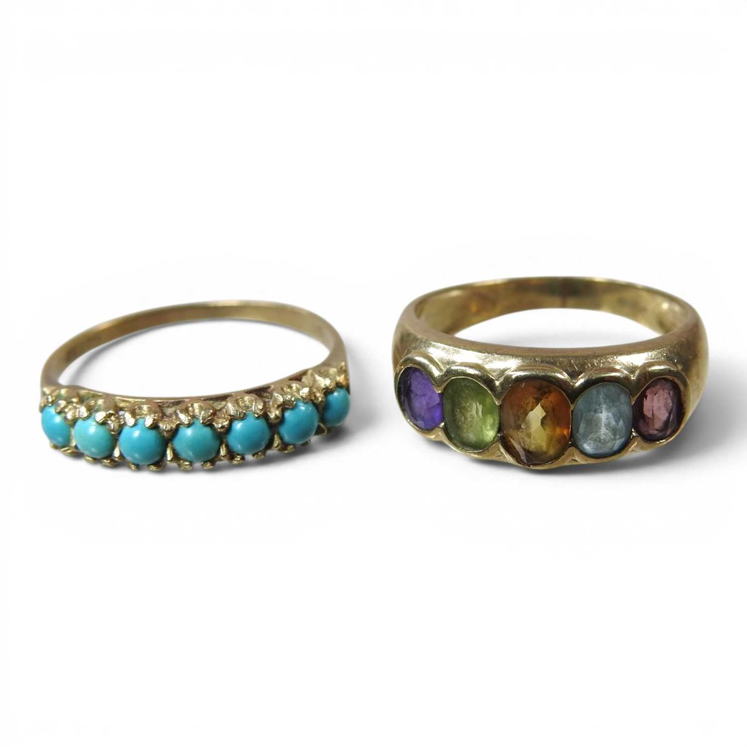 Lot 210 - A 9 carat gold multi gem set dress ring, set