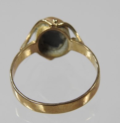 Lot 127 - A 9 carat gold opal dress ring, of oval Lot 127 - A 9 carat gold opal dress ring, of oval