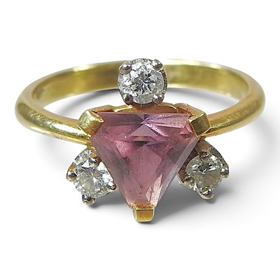 Lot 70 - An 18 carat gold trillion cut pink sapphire...