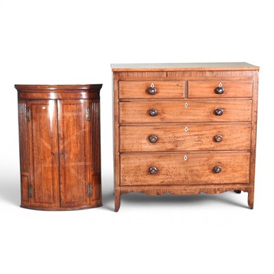 Lot 776 - A Regency mahogany chest of drawers, on swept...