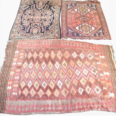 Lot 724 - A Turkish kelim rug, with rows of lozenges on...